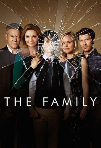 The poster features four characters standing against a dark background with a shattered glass effect, symbolizing conflict or uncertainty. The warm tones of their clothing contrast with the cool, cracked colors around them. The title "THE FAMILY" is prominently displayed in bold white letters at ...