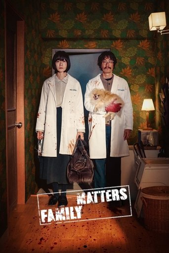 The poster features two characters in white coats standing in a dimly lit room with green wallpaper. A man holds a dog while a woman holds a purse. The warm lighting and cozy atmosphere suggest a family drama. The title "Family Matters" is prominently displayed at the bottom.
