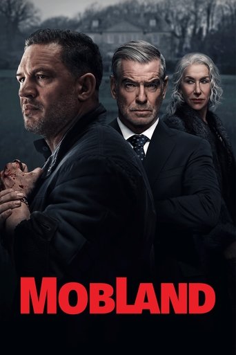 The poster features three men in dark suits against a moody, overcast sky, with red text at the bottom reading "MOB LAND." The atmosphere is tense and gritty, suggesting a crime drama or thriller.