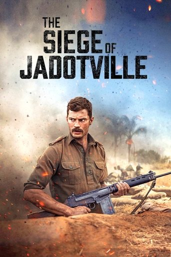 The poster features a rugged soldier in a desert setting, holding a rifle, with a smoky, war-torn backdrop. The muted earth tones and gritty atmosphere evoke a tense, action-packed mood.