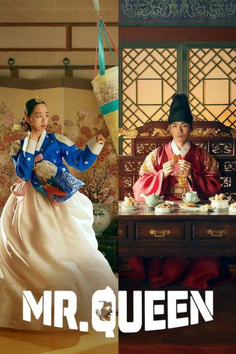 The poster features two women in traditional Korean attire, one in blue and white, the other in red and white, both seated at a wooden table with tea cups. The warm, golden lighting evokes a serene, historical atmosphere, suggesting a blend of elegance and cultural richness. The title "Mr. Queen"...