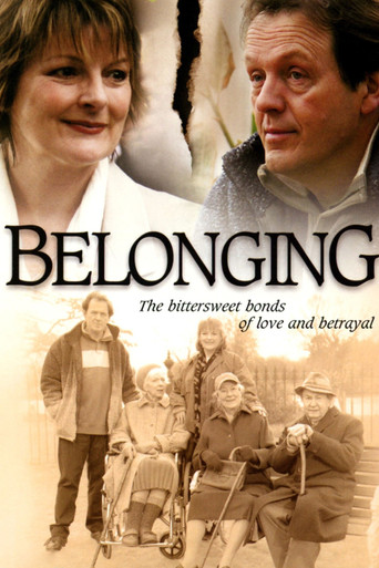 The poster features a warm, sepia-toned image of a group of people in a vintage setting, evoking nostalgia and connection. The title "Belonging" is prominently displayed in bold, serif font, with the tagline "The bittersweet bonds of love and betrayal" beneath it. The overall mood is reflective a...