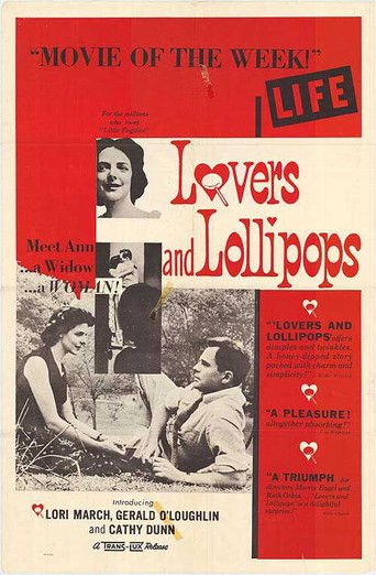 This vintage movie poster for "Lovers and Lollipops" features a romantic black-and-white scene with two women laughing and a man smiling, evoking a nostalgic, cheerful mood. The poster uses bold red and black colors, with the title prominently displayed in a playful font. The text suggests a clas...