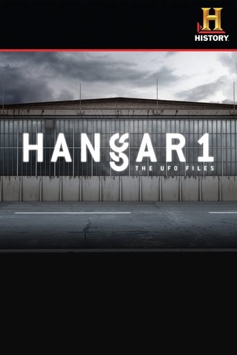The poster features a dark, moody scene with a large industrial building under a stormy sky. The word "HANGAR 1" is prominently displayed in bold white letters. The overall mood is mysterious and suspenseful, evoking the classic horror genre.
