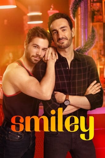 This TV show poster features two men in a vibrant, warm-toned setting that exudes a playful and energetic mood. The man on the left, wearing a sleeveless top, leans affectionately against the man on the right, who sports a plaid shirt and a watch. The bold, colorful text "smiley" anchors the imag...