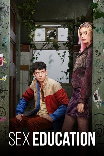 The poster features a young man in a red and beige jacket sitting on a cluttered desk, while a blonde woman in a purple dress stands behind him. The room is filled with greenery and clutter, creating a somewhat chaotic yet intriguing atmosphere. The bold text "SEX EDUCATION" at the bottom emphasi...