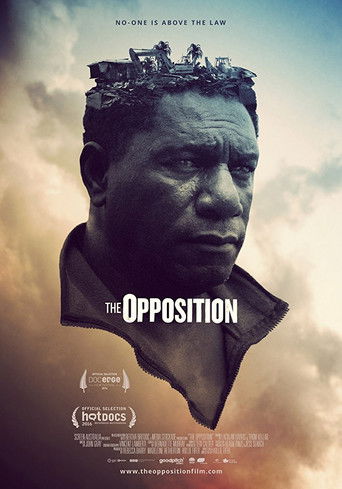 The poster features a solemn portrait of a man with a crown of thorns, evoking themes of resistance and struggle. The muted tones and dramatic lighting create a somber mood, while the title "The Opposition" is prominently displayed in bold, white lettering.