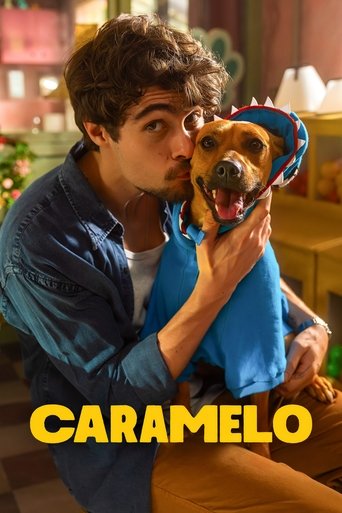 A young man in a blue shirt kisses a dog wearing a blue hat, with warm lighting and cozy background elements. The title "Caramelo" appears in bold yellow letters at the bottom.