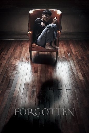 The poster features a solitary figure reclining in a dimly lit, vintage-style chair, casting a dramatic shadow on the polished wooden floor. The muted, sepia-toned palette and low-key lighting evoke a somber, mysterious atmosphere, suggesting themes of memory, loss, and introspection.
