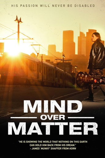 The poster features a man in a leather jacket holding a camera against a sunset backdrop, with a city skyline and train in the distance. The warm, golden hues create a nostalgic yet mysterious atmosphere, emphasizing themes of memory and connection.