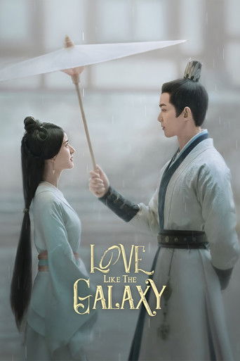 The poster features a tender scene of two ancient-looking characters in flowing robes, sharing an intimate moment under a white umbrella. The soft, ethereal lighting and muted color palette evoke a romantic, dreamlike atmosphere. The title "Love Like the Galaxy" is elegantly displayed in golden s...