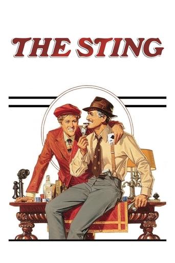 The vibrant poster features two men in period attire, one in a red suit and hat, the other in a beige jacket and bowler hat, seated on a wooden desk. The warm colors of their clothing and the red title text create a nostalgic, dramatic atmosphere that hints at the film's comedic and dramatic blend.
