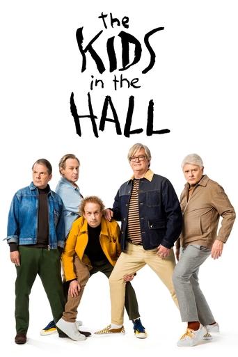 The poster features six diverse characters in casual, relaxed poses against a stark white background. Their varied clothing and expressions convey a sense of camaraderie and humor, evoking a warm, friendly atmosphere. The bold, playful typography of "The Kids in the Hall" adds a touch of whimsy, ...