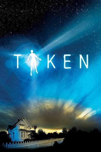 The poster features a silhouette of a person standing in front of the title "Taken," set against a starry night sky with radiant beams of light. Below, a serene suburban house bathed in golden light suggests a peaceful yet mysterious atmosphere. The overall mood is one of supernatural intrigue an...
