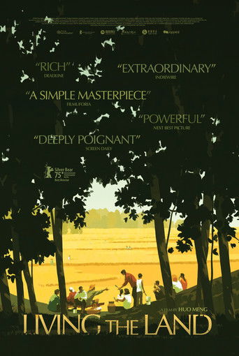 The poster features silhouetted trees against a warm, golden sunset, evoking a serene and nostalgic mood. A group of people sits peacefully in the foreground, surrounded by lush greenery, suggesting a connection to nature and tranquility. The title "Living the Land" anchors the image, emphasizing...