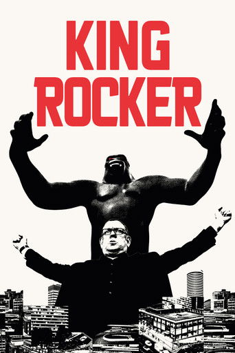 The poster features a muscular figure with arms raised against a cityscape backdrop, with the bold red title "KING ROCKER" dominating the top. The black-and-white imagery conveys a gritty, dramatic atmosphere, emphasizing strength and rebellion.