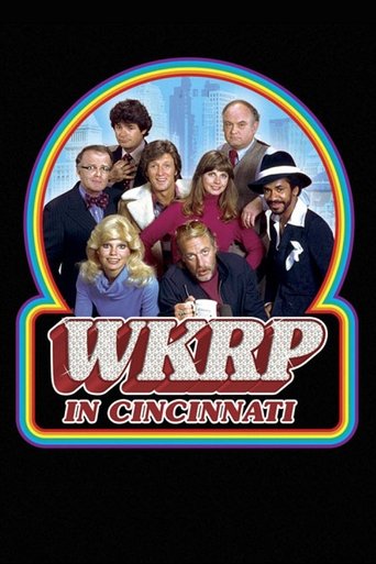 The poster features a vibrant, rainbow-colored border framing a group of characters against a dark background. The characters are dressed in period-appropriate attire, exuding a nostalgic, classic TV show vibe. The bold, stylized text "WKRP in Cincinnati" dominates the lower portion, emphasizing ...