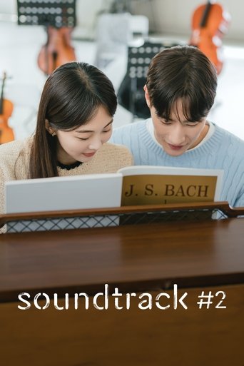 A couple sits at a wooden table, reading a sheet music with "J.S. Bach" prominently displayed. Warm lighting and soft colors create a cozy, intimate atmosphere. The mood is one of shared appreciation and musical connection.