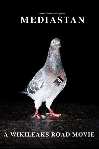 The poster features a striking pigeon with a red collar, set against a stark black background. The title "Mediastan" is prominently displayed in bold white letters, while "A Wikileaks Road Movie" appears at the bottom. The overall mood is mysterious and intriguing, with the pigeon's unique appear...