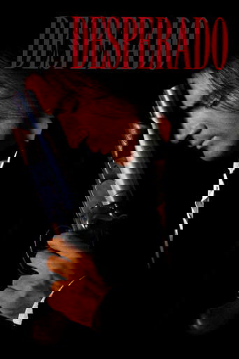 The poster features a man in a dark suit holding a revolver, with the title "DESPERADO" in bold red letters against a black background. The mood is intense and suspenseful, capturing the essence of a classic action thriller.