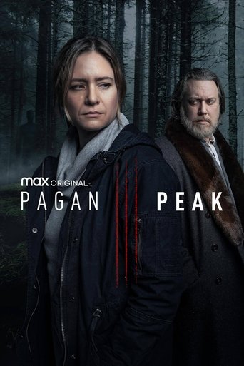 The poster features two characters in a dark, misty forest setting. The woman in the foreground wears a dark coat and looks determined, while the man behind her wears a lighter coat and has a serious expression. The title "Pagan Peak" is prominently displayed in white text, with red vertical line...