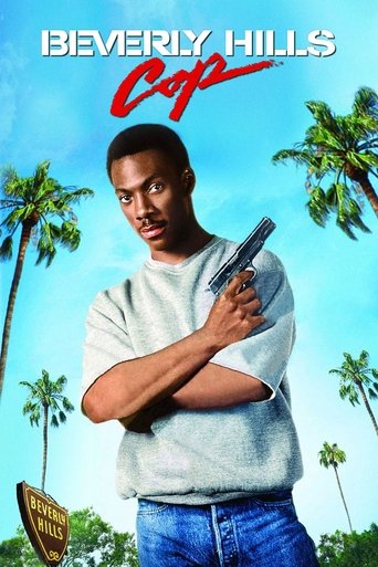 The poster features a confident black man in a casual gray shirt and jeans, holding a gun against a vibrant blue sky. Palm trees frame the scene, evoking a tropical setting. The bold red "Cop" title and Beverly Hills sign add a classic Hollywood feel, suggesting action and adventure.