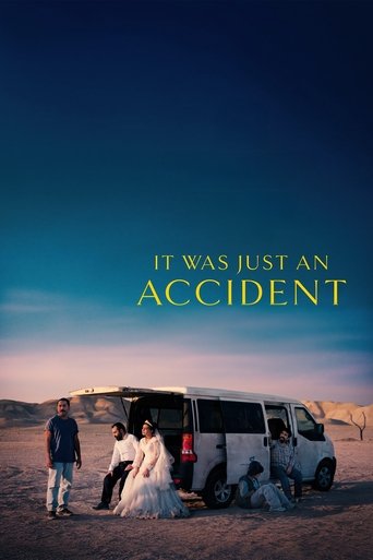 The poster features a group of people gathered around a white van in a desert landscape, evoking a sense of mystery and adventure. The warm sunset hues blend with the cool blues of the sky, creating a dramatic and romantic atmosphere. The title, "It Was Just an Accident," hints at a story of unex...