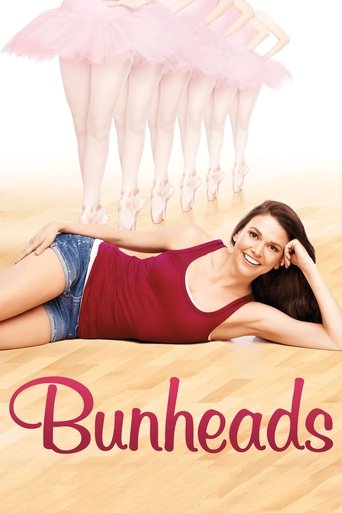 A young woman in a red tank top and denim shorts lies on a sandy beach, smiling at the camera. Above her, six ballerinas in pink tutus float gracefully against a bright sky. The title "Bunheads" appears in elegant pink script at the bottom. The mood is playful, dreamy, and carefree.