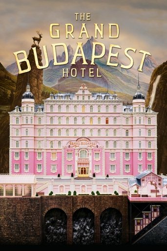 The poster features a grand pink hotel with a whimsical, cartoonish aesthetic. The title is prominently displayed in gold letters, evoking a sense of luxury and adventure. The mood is playful yet mysterious, hinting at the film's blend of fantasy and realism.