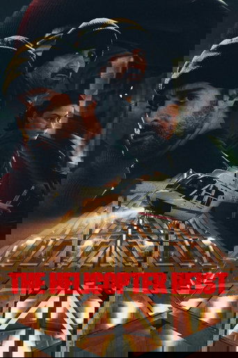 The poster features three men in dark clothing, with one prominently in the foreground wearing a black beanie. A white helicopter is suspended above them, hinting at the heist action. The background is dimly lit with warm tones, creating an ominous yet adventurous atmosphere. The title "THE HELIC...