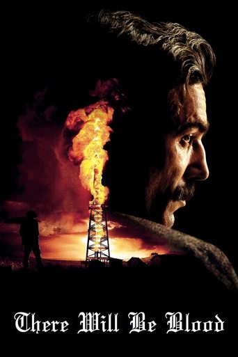 The poster features a man with a rugged face, his eyes wide and intense, set against a dramatic backdrop of a burning oil rig. The fiery orange and red hues create a sense of danger and urgency, while the dark silhouette of a figure in the background adds to the ominous atmosphere. The title "The...