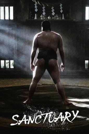 The poster features a muscular man in black wrestling trunks, standing with his back to the viewer in a dimly lit, gritty arena. The dark, moody lighting and shadowy background create an intense, mysterious atmosphere. The title "SANCTUARY" is prominently displayed in bold, distressed white lette...