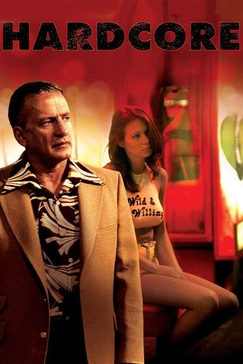 The poster features a man in a beige jacket and a woman in a white tank top, both exuding confidence. The warm red and orange tones create an intense atmosphere, while the bold title "HARDCORE" at the top emphasizes the gritty, edgy tone of the film.