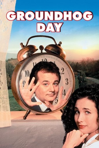The poster features a man and woman in a dreamlike setting, with the title "Groundhog Day" prominently displayed. The warm sunset colors evoke a nostalgic, dreamlike mood, while the large alarm clock symbolizes the repetitive nature of the story.