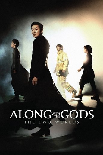 The poster features four figures in dramatic poses against a dark, moody background with dramatic lighting. The central figure stands prominently in black, while others are cast in warm tones, creating a striking contrast. The title "Along with the Gods: The Two Worlds" is boldly displayed at the...