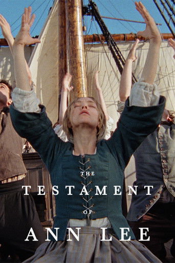 The poster features a woman with arms raised, her face illuminated by sunlight, evoking a sense of freedom and triumph. The title "The Testament of Ann Lee" is prominently displayed in bold, white lettering against the backdrop of a ship's rigging.
