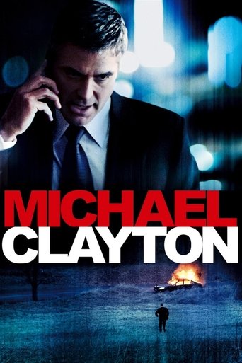 The poster features a man in a suit holding a phone to his ear, exuding a mysterious and professional demeanor. The title "MICHAEL CLAYTON" is prominently displayed in bold red and white letters. The background is dark with a faint silhouette of a figure walking away, and a small fire glows in th...