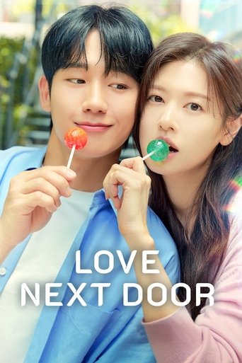 The poster features a young couple in bright, cheerful colors—blue and pink—holding lollipops, suggesting a sweet and romantic atmosphere. The text "LOVE NEXT DOOR" anchors the image, emphasizing the theme of mutual affection and closeness.