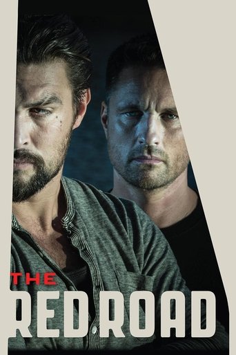 The poster features two rugged men in a dark, moody atmosphere with muted tones. The title "The Red Road" is prominently displayed in bold white letters, evoking a sense of danger and adventure.