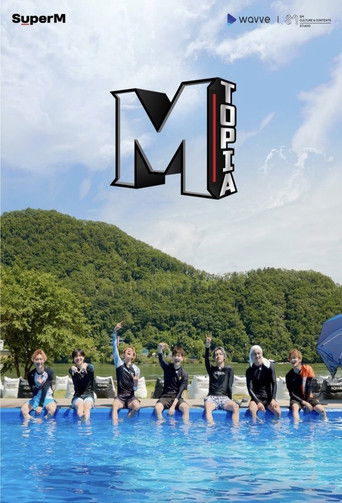 The poster features a group of people standing on the edge of a bright blue pool, with lush green hills in the background under a clear sky. The bold "M" logo dominates the center, while the word "TOPIA" is vertically written in white letters on a red background. The overall mood is energetic and...