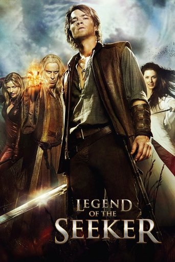 This poster features a dramatic scene with four characters in a fantasy setting. The central figure, a man in a brown coat, stands prominently against a stormy sky. To his left, a woman with long hair holds a sword, while another woman with a fiery background adds intensity. The title "Legend of ...