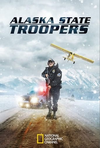 The poster features a soldier in tactical gear standing on a snowy road with a plane flying overhead, while a car with headlights illuminates the scene. The muted blue and white tones convey a cold, serious mood, emphasizing the harsh environment and the readiness of the troops.