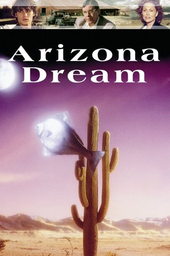 The poster features three people with hopeful expressions against a vibrant sunset backdrop. A glowing sun and a desert landscape evoke a dreamy, optimistic mood. The title "Arizona Dream" is prominently displayed in bold, white letters.