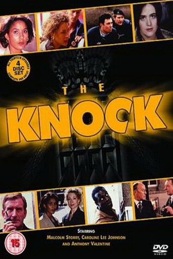 The poster features a dramatic black background with a glowing yellow title "THE KNOCK" in bold, metallic letters. Surrounding the title are portraits of actors in various dramatic poses, suggesting a serious or suspenseful tone. The overall design conveys a sense of mystery and intensity, with a...