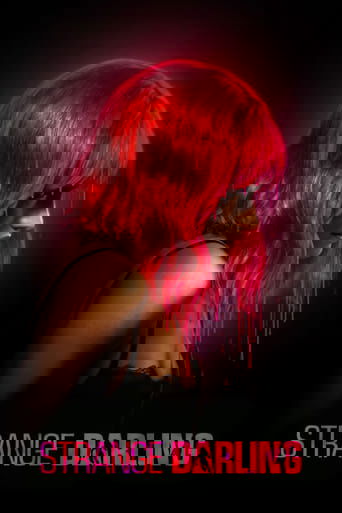 The poster features a striking woman with vibrant red hair cascading down her face, creating a dramatic and mysterious atmosphere. The dark background enhances the vivid colors, while the title "Strange Darling" in bold pink letters at the bottom adds a sense of intrigue and suspense.