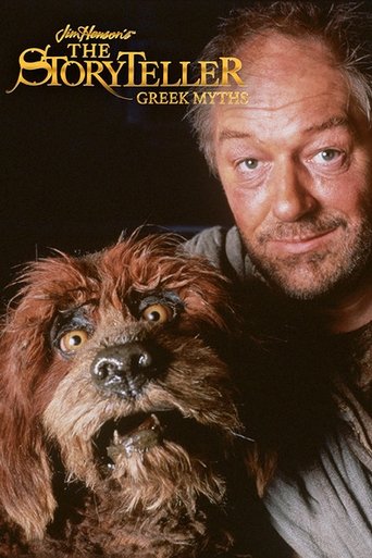 The Storyteller: Greek Myth poster features a man with a warm, inviting smile and a fluffy dog with expressive eyes. The dark background highlights the golden title text, creating an atmospheric and mysterious mood.