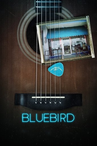 The poster features an acoustic guitar with a framed photo of a lively street scene, capturing the essence of a bustling town. The warm tones of the wood contrast with the cool blue of the guitar's body and the vibrant blue bird logo. The overall mood is nostalgic yet energetic, evoking a sense o...