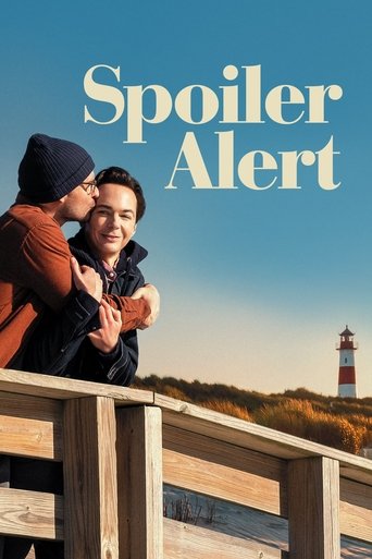 The poster features two young people embracing on a wooden pier against a clear blue sky. The warm tones of their clothing and the vibrant sunset create a cozy, intimate mood. The title "Spoiler Alert" is prominently displayed in bold, white letters, hinting at the thrilling content within.