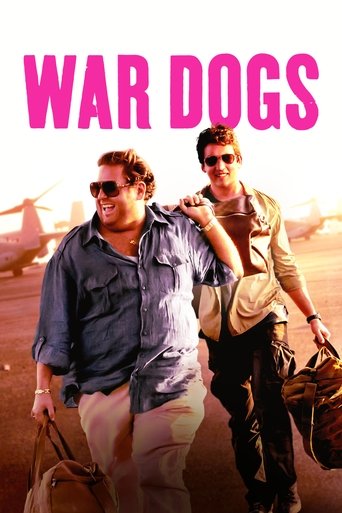 The poster features two men in a desert setting, exuding a rugged and adventurous mood. Their confident poses and sunglasses add to the film's action-packed theme. The bold pink title contrasts sharply with the warm, golden hues of the background, emphasizing the movie's intense and thrilling nat...