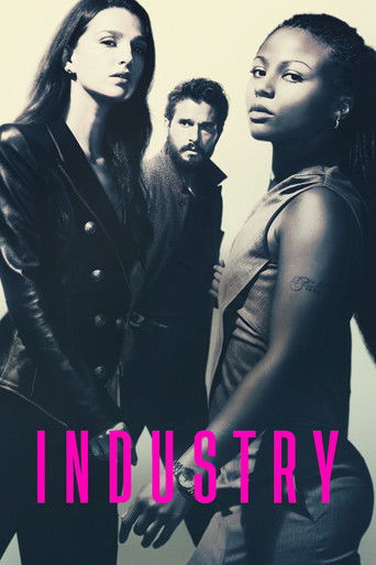 The poster features three women in a dimly lit, moody setting with a gritty, industrial atmosphere. The women are dressed in dark, rugged clothing, exuding strength and resilience. The word "INDUSTRY" is prominently displayed in bold, pink letters, emphasizing the theme of hard work and industry....